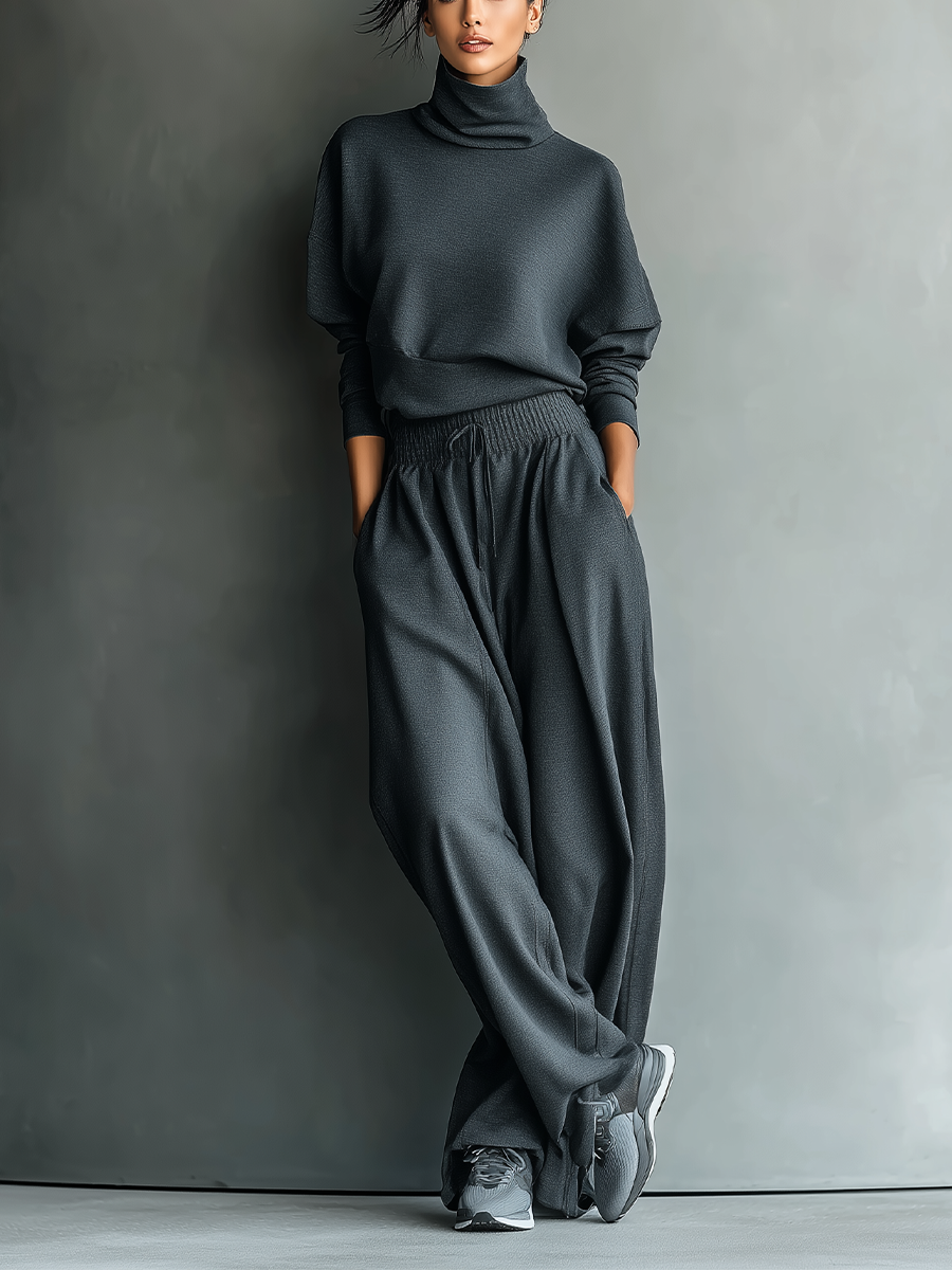 Conjunto de mujer de punto de carbón con cuello alto y pantalones de pierna ancha